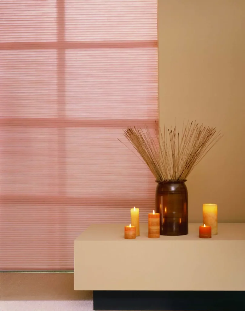 Honeycomb_030-1-scaled-opti Pink cellular window blinds in a meditation room