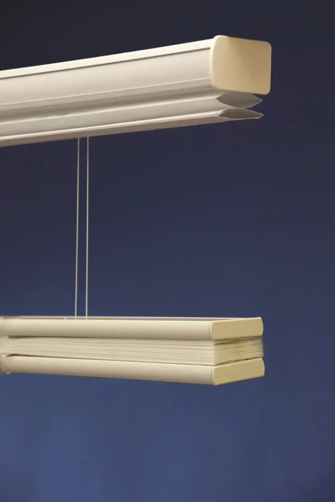 Wholesale-Blind-Factory-Shades-Cellular-Shades_AI-opti Custom made white honeycomb blinds, retracted.