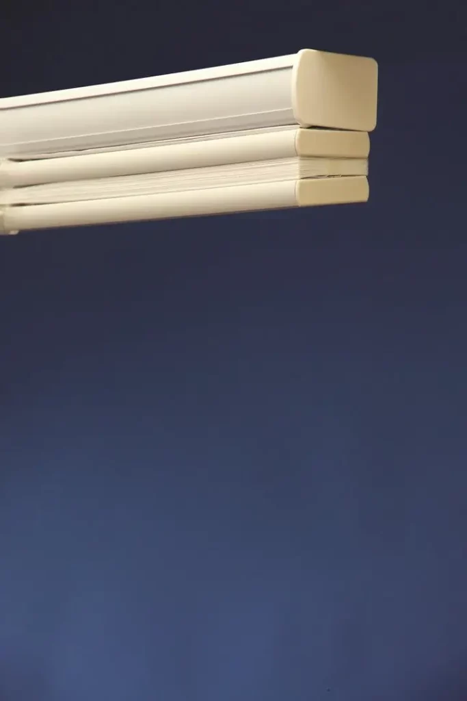 Wholesale-Blind-Factory-Shades-Cellular-Shades_AJ-opti White cellular blinds, retracted to the top.