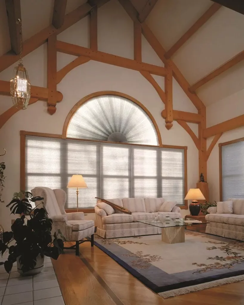 Wholesale Blind Factory custom blinds made to fit a complex window array in a beautiful living room