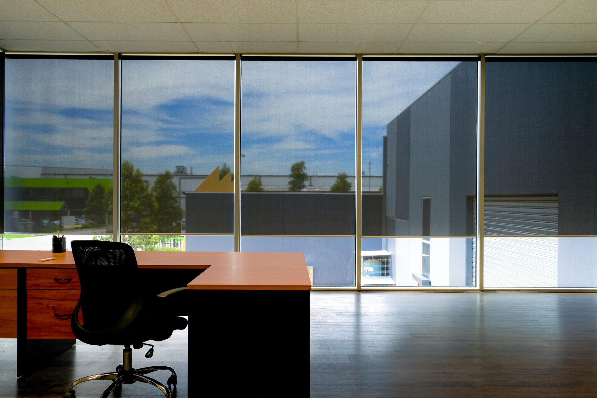Window blinds in modern office for privacy. Wholesale Blind Factory
