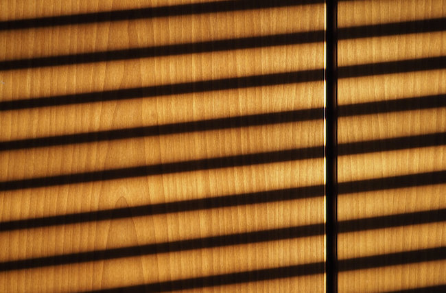 close up view of faux wooden blinds